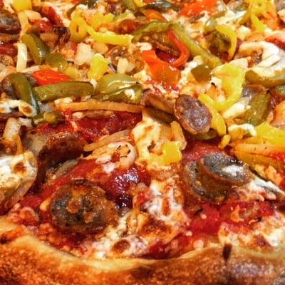 Custom made: Pepperoni, Sausage, Onions, Peppers, and Banana Peppers. Very Delicious