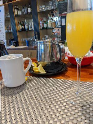 Mimosa and hot tea at the bar