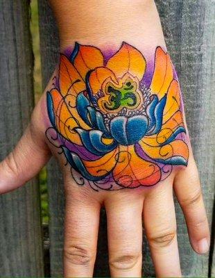 Custom art - Lotus flower on a hand tattoo