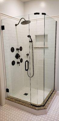 3/8 custom framless shower with oil rubbed bronze hardware!  Beautiful!!! Leak and water spot resistant with our enduro shield