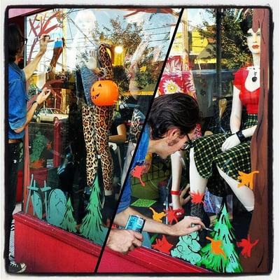 Our very own Matt Stanger painting Halloween/Fall windows 2014.