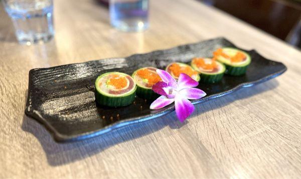 Green Garden Roll: cucumber wrap w/ salmon, tuna, hamachi, avocado, crabmeat