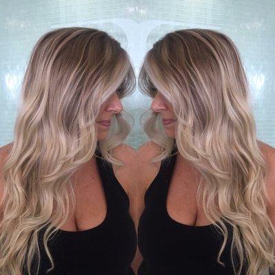 Bomb shell blonde by Master 2 stylist Nicole