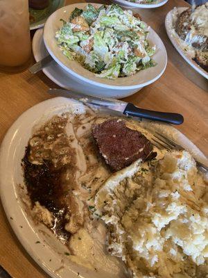 8oz Fillet with potato covered in cheese and Caesar salad