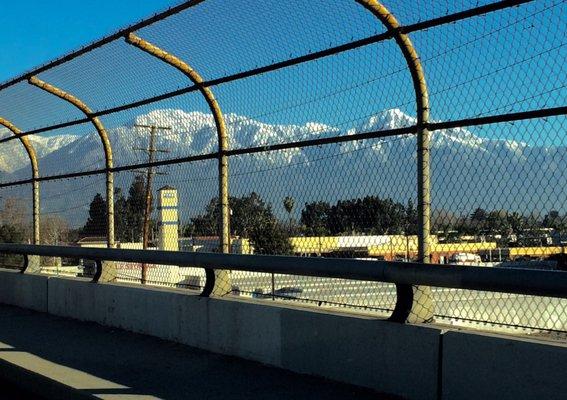 The snowy San Gabriel Mountains viewed from the Central Avenue bridge in Montclair.