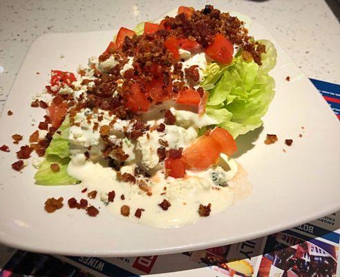 Wedge salad. Pretty tasty but too much dressing.