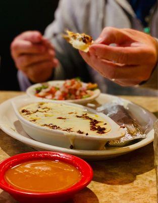 Choriqueso w/habanero hot sauce on the side. Choriqueso comes with pico salad & tortillas.