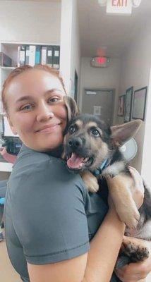 Technician Assistant Madison getting ALL the puppy love.