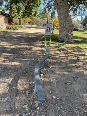 Balance beam stop on walking path