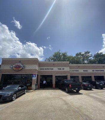 Front Entrance, plenty of parking and multiple bays to services cars.