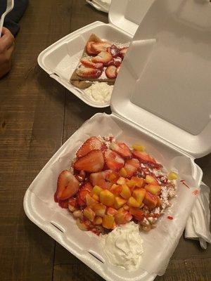 Funnel cake with fresh mango and strawberries