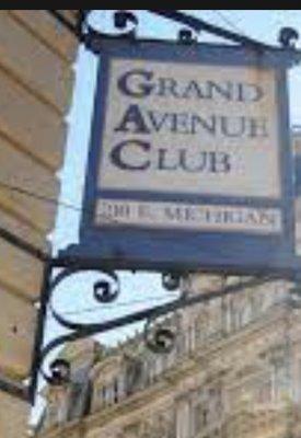 Grand Avenue Club sign at corner of 
 Michigan & Water