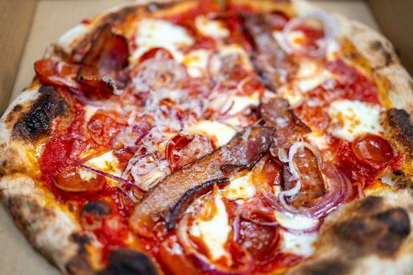 Double Pepperoni Pizza w/ extra Mozz, Red Onions, Bacon & Truffle Oil ($22 + add-ons [you don't want to know])