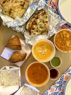 Chicken tikka, aloo goni, coconut shrimp, samosas, naan