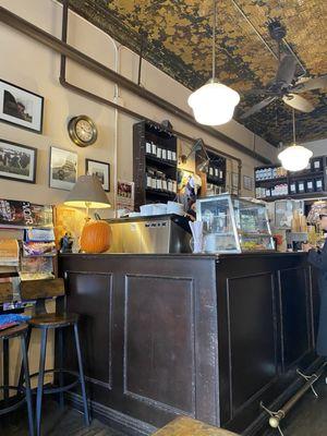 View of the barista counter from the seating area. There was a constant line of patrons buying coffee and ordering refills.