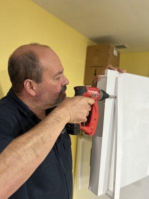 Replacing handle on Whirlpool top freezer door