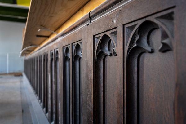 We re-purposed the old church pews and worked it into the bar design.