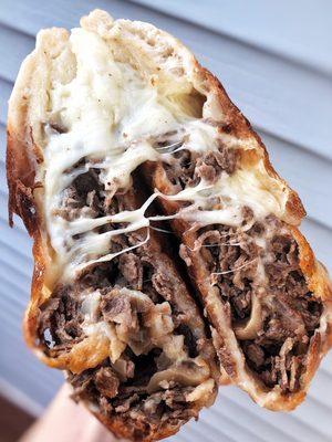 Steak and cheese calzone