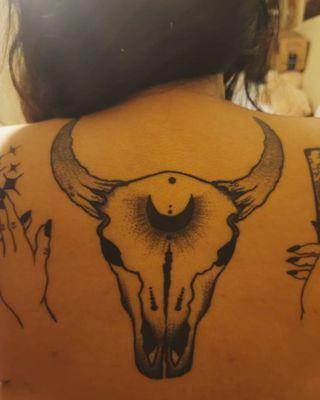 Cow skull tattoo done by Lina