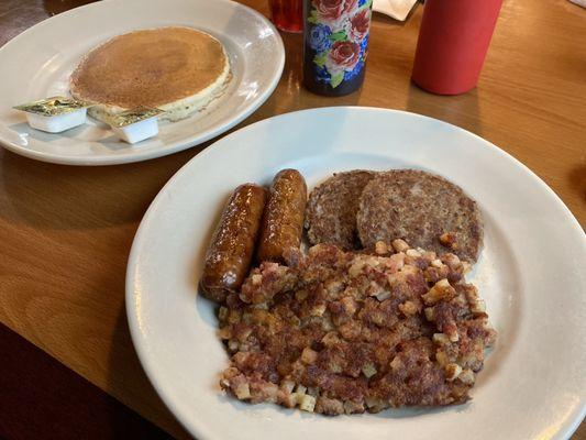 Side orders: Corn beef hash, sausage links, sausage patties, and a pancake