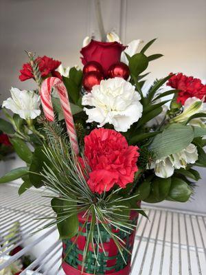 Christmas Arrangements of all sizes and budgets. Perfect for table or home decoration and gifts.