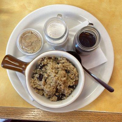 Quinoa, almond milk, maple syrup, brown sugar, cherries, pecans and almonds.