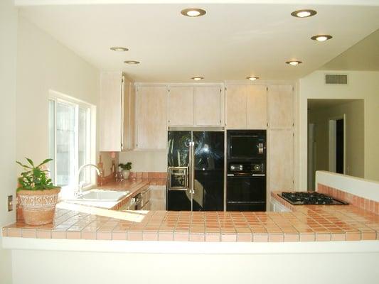 Original tile countertops, upgraded by designer, Candice harding