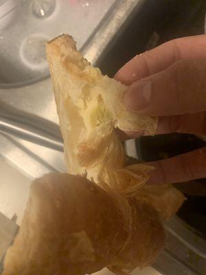 One of the pastries with yellow mold near the top of my thumb.