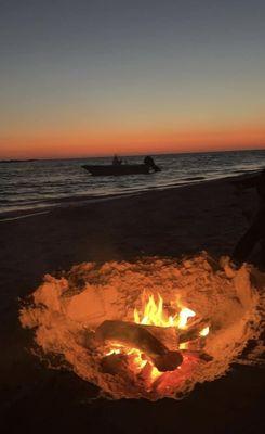 Camp fire on Shell Key Preserve Island, East of Fort Desoto Island, West of Pass-A-Grille & St Pete Beach, Tampa Bay