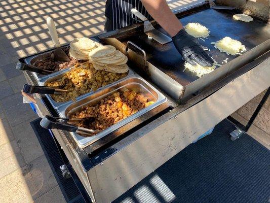 Asada, chicken, and pastor with pineapple (top to bottom in picture). Cheese quesadillas on the grill.