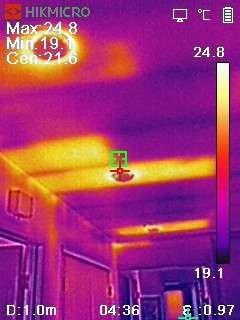 Infrared image showing insulation gaps and voids in attic.