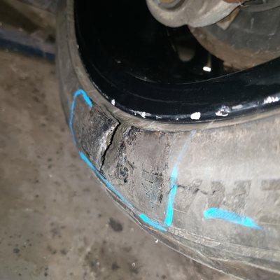 The tire they GLUED to repair!!