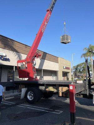 My HVAC Package unit being put on the roof.