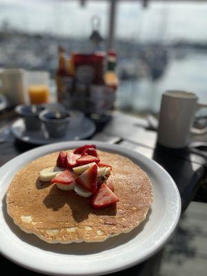 Pancakes/added strawberries and bananas topping