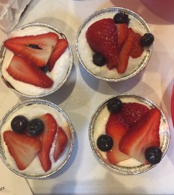 Chocolate cake with infused whipped cream and fresh seasonal fruit.