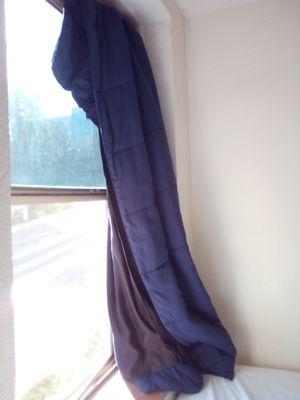 The blanket I was given to cover the broken out window in my room after maintenance took what was left for "repairs".....