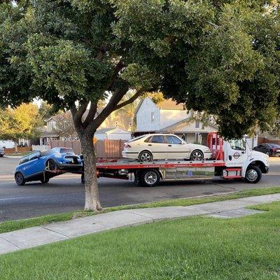 My car being dropped in the middle of the street.