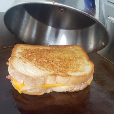 Big Jay's grilled cheese with colby and cheddar cheese, bacon, and granny smith apple