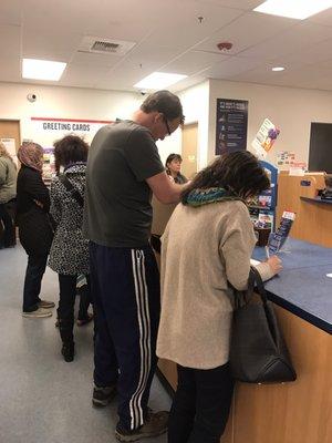 There's 10 people in line ahead of me around 1 p.m. on a Monday afternoon with 2 employees to help. This will take a while...