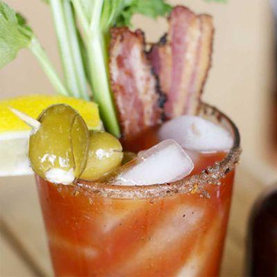 A classic recipe with a twist. Bacon vodka with plenty of fresh garnishes.