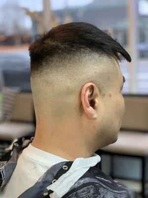 High skin fade on coarse straight hair