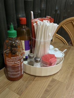 Condiments and utensils on the table