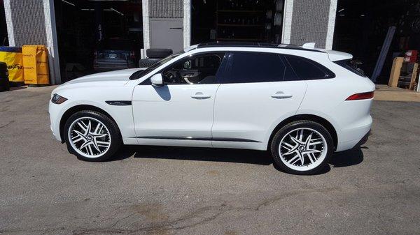 2017 Jaguar F Pace with 22" Forgiato Wheels and 265/40/22 Continental Extreme Contact Tires.