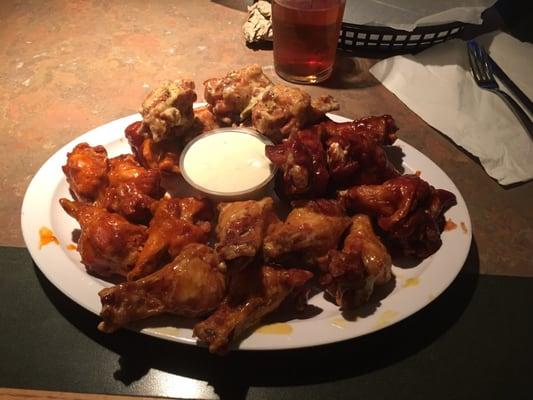 Wings!  4 Flavors here (their homeade spicy ranch, bbq, spicy garlic and honey mustard). Huge drumsticks!