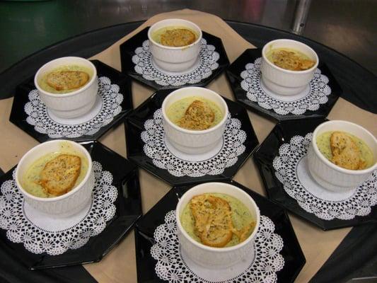 Creamy spinach and artichoke bisque, toasted parmesan crouton