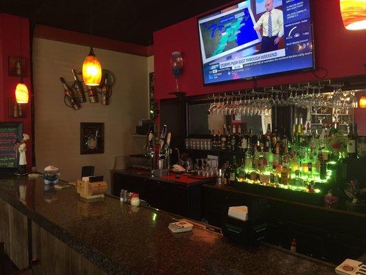 Bar area, colors slowly change on the drinks at the bar