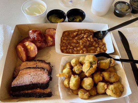 2 Meat Plate w/ brisket, jalapeño cheese sausage, fried okra, BBQ beans, onions, pickles, jalapeños and sliced white bread (not in picture).