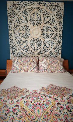 Mandala over headboard with accent wall and new bedding