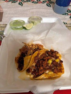 Left: shredded chicken and chorizo
 
 Right: pork and pineapple (as pastor)
 
 Top: avocado crema / cilantro sauce