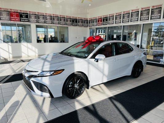 Joey surprised me with a big red bow for my new car!